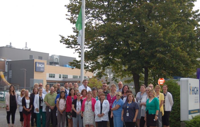 Group attending Franco-Ontarian flag raising ceremony at HGH