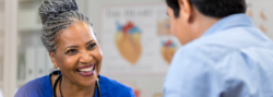 Nurse speaking with patient