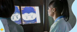 medical imaging healthcare workers looking at screen